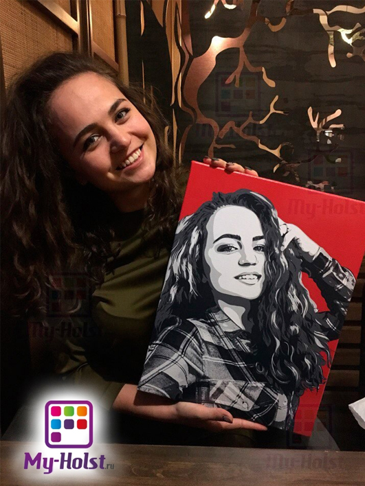 Девушка держит в руках картину со своим изображением в обработке